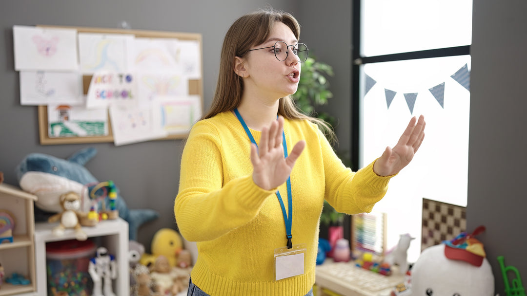 Teacher asking room to settle down quiet