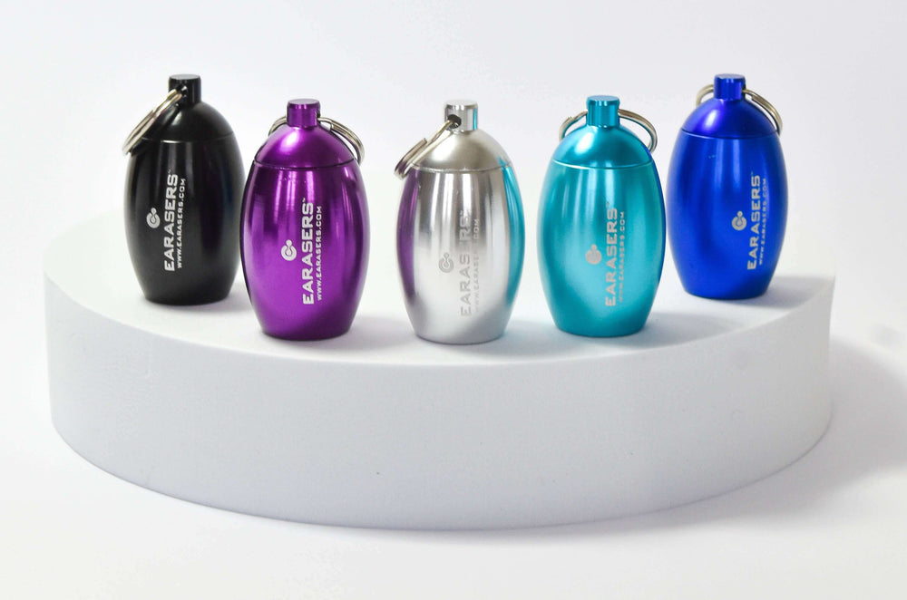 Stashcans of different colors on a pedestal